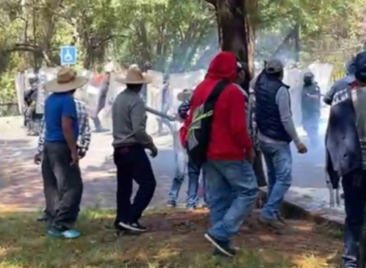 Se enfrentan comuneros y Guardia Civil en Casa Michoacán